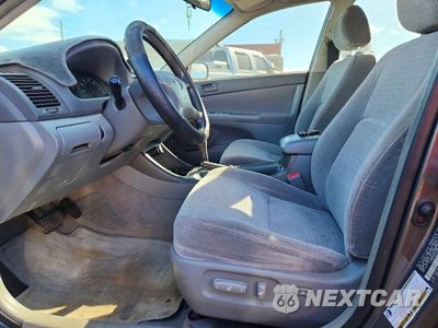 Zdjęcie 7 z 12 samochodu: 2004 TOYOTA CAMRY STANDARD VIN:JTDBE32K840280959 - miniatura