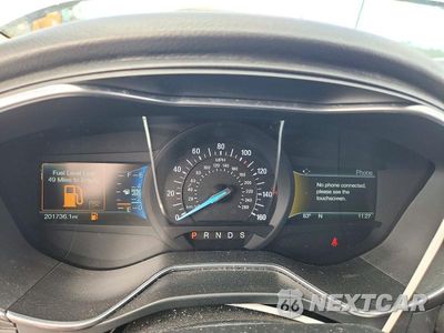 Zdjęcie 9 z 12 samochodu: 2017 FORD FUSION TITANIUM VIN:3FA6P0K91HR130727 - miniatura