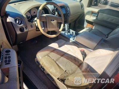 Zdjęcie 8 z 12 samochodu: 2004 FORD F150 VIN:1FTRX12524KD38317 - miniatura