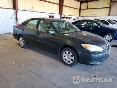 Czwarte zdjęcie samochodu z boku: 2002 TOYOTA CAMRY LE VIN:4T1BE32K42U598501 - miniatura