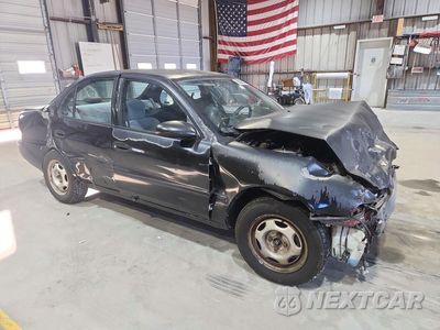 Czwarte zdjęcie samochodu z boku: 1997 GEO PRIZM BASE VIN:1Y1SK5264VZ430047 - miniatura