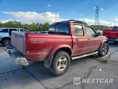 Trzecie zdjęcie samochodu z tyłu: 2000 NISSAN FRONTIER XE VIN:1N6ED27Y7YC410609 - miniatura