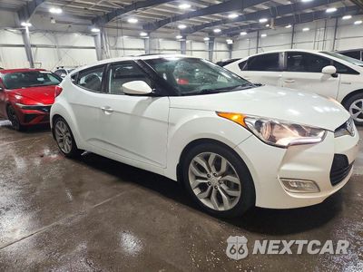 Czwarte zdjęcie samochodu z boku: 2016 HYUNDAI VELOSTER BASE VIN:KMHTC6AD2GU251688 - miniatura