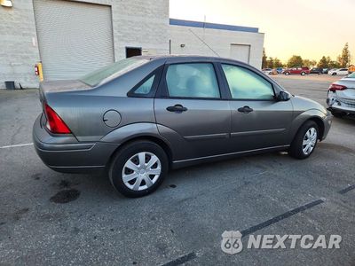 Trzecie zdjęcie samochodu z tyłu: 2004 FORD FOCUS SE COMFORT VIN:1FAFP34Z74W104784 - miniatura