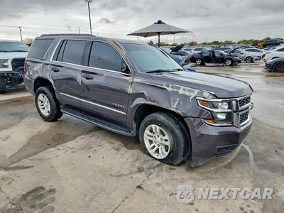 Czwarte zdjęcie samochodu z boku: 2018 CHEVROLET TAHOE VIN:1GNSCBKC7JR267806 - miniatura