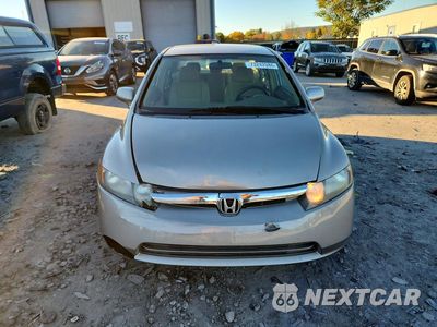 Piąte zdjęcie samochodu w środku: 2006 HONDA CIVIC LX VIN:1HGFA165X6L098270 - miniatura