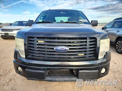 Piąte zdjęcie samochodu w środku: 2014 FORD F150 SUPERCREW VIN:1FTEW1CM0EKG31321 - miniatura