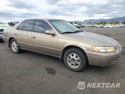 Czwarte zdjęcie samochodu z boku: 1999 TOYOTA CAMRY LE VIN:4T1BG22K5XU595926 - miniatura