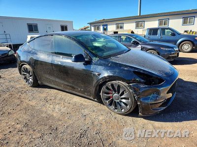 Czwarte zdjęcie samochodu z boku: 2022 TESLA MODEL Y VIN:7SAYGDEFXNF443416 - miniatura