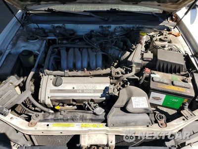 Zdjęcie 11 z 12 samochodu: 1999 NISSAN MAXIMA GXE VIN:JN1CA21D2XT204284 - miniatura