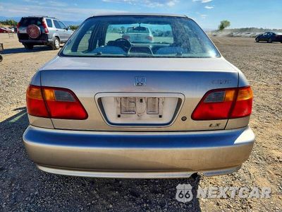 Zdjęcie 6 z 12 samochodu: 2000 HONDA CIVIC LX VIN:1HGEJ6575YL009915 - miniatura