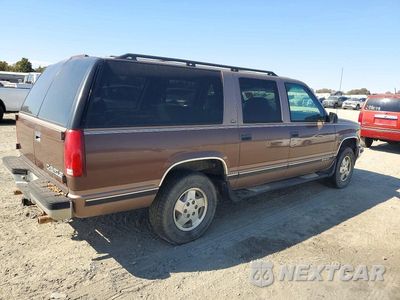 Trzecie zdjęcie samochodu z tyłu: 1994 GMC SUBURBAN VIN:1GNFK16K4RJ420863 - miniatura