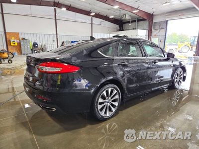 Trzecie zdjęcie samochodu z tyłu: 2019 FORD FUSION SE VIN:3FA6P0T92KR253880 - miniatura