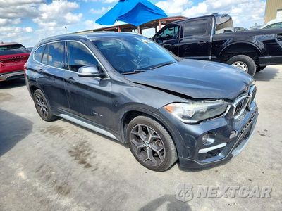 Czwarte zdjęcie samochodu z boku: 2018 BMW X1 SDRIVE28I VIN:WBXHU7C39J5H41697 - miniatura
