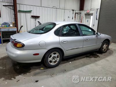 Trzecie zdjęcie samochodu z tyłu: 1997 FORD TAURUS GL VIN:1FALP52U0VA279673 - miniatura