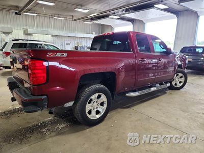 Trzecie zdjęcie samochodu z tyłu: 2016 CHEVROLET SILVERADO K1500 LT VIN:1GCVKREC5GZ254431 - miniatura