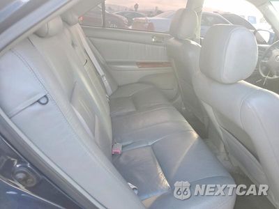 Zdjęcie 10 z 12 samochodu: 2002 TOYOTA CAMRY XLE VIN:4T1BE30KX2U625722 - miniatura