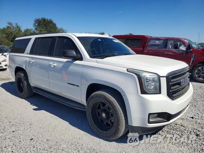 Czwarte zdjęcie samochodu z boku: 2015 GMC YUKON XL C1500 SLT VIN:1GKS1HKC8FR569229 - miniatura