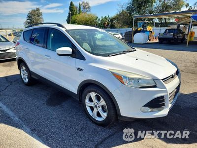 Czwarte zdjęcie samochodu z boku: 2016 FORD ESCAPE SE VIN:1FMCU0GX1GUB51867 - miniatura