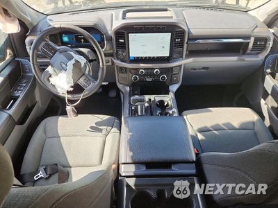 Zdjęcie 8 z 13 samochodu: 2024 FORD F150 LIGHTNING XLT VIN:1FTVW3LK4RWG06236 - miniatura