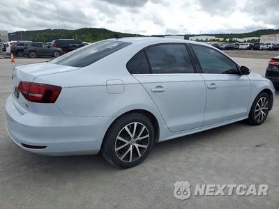 Trzecie zdjęcie samochodu z tyłu: 2017 VOLKSWAGEN JETTA SE VIN:3VWDB7AJ7HM382139 - miniatura