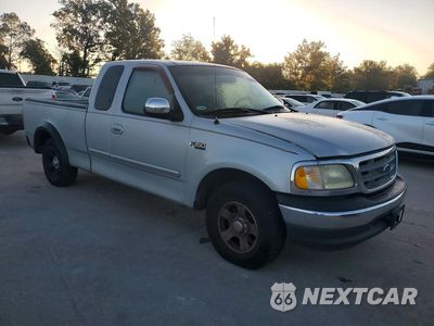 Czwarte zdjęcie samochodu z boku: 2001 FORD F150 VIN:1FTZX17201NB95098 - miniatura