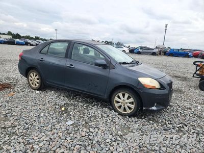 Czwarte zdjęcie samochodu z boku: 2009 TOYOTA YARIS BASE VIN:JTDBT903894051878 - miniatura