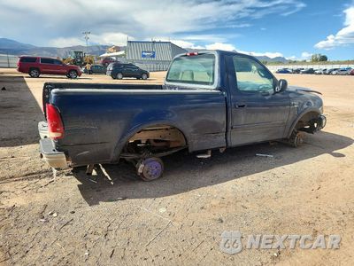 Trzecie zdjęcie samochodu z tyłu: 2000 FORD F150 VIN:1FTRF18LXYNB94593 - miniatura