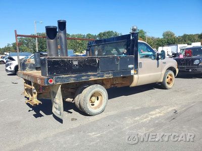 Trzecie zdjęcie samochodu z tyłu: 1999 FORD F350 SUPER DUTY VIN:1FDWF36S4XEA73142 - miniatura