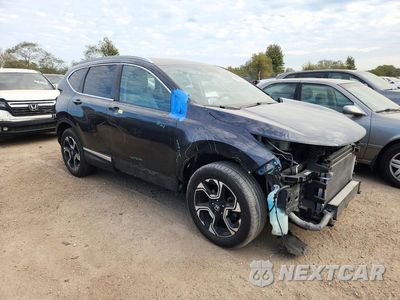 Czwarte zdjęcie samochodu z boku: 2017 HONDA CR-V TOURING VIN:7FARW1H96HE022617 - miniatura