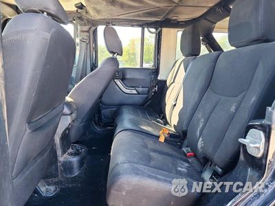Zdjęcie 10 z 12 samochodu: 2015 JEEP WRANGLER UNLIMITED SPORT VIN:1C4BJWDGXFL641633 - miniatura