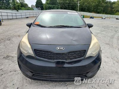 Piąte zdjęcie samochodu w środku: 2014 KIA RIO LX VIN:KNADM4A39E6385632 - miniatura