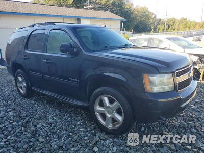 Czwarte zdjęcie samochodu z boku: 2011 CHEVROLET TAHOE K1500 LT VIN:1GNSKBE0XBR383684 - miniatura