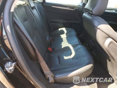 Zdjęcie 10 z 13 samochodu: 2016 FORD FUSION TITANIUM PHEV VIN:3FA6P0SU1GR141911 - miniatura