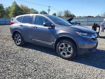 Czwarte zdjęcie samochodu z boku: 2017 HONDA CR-V EXL VIN:2HKRW2H88HH627085 - miniatura