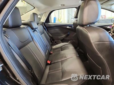 Zdjęcie 10 z 12 samochodu: 2014 FORD FOCUS TITANIUM VIN:1FADP3J22EL105181 - miniatura
