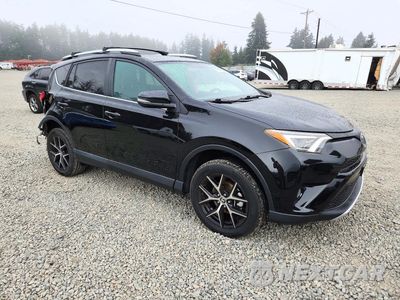 Czwarte zdjęcie samochodu z boku: 2016 TOYOTA RAV4 SE VIN:2T3JFREV1GW418035 - miniatura