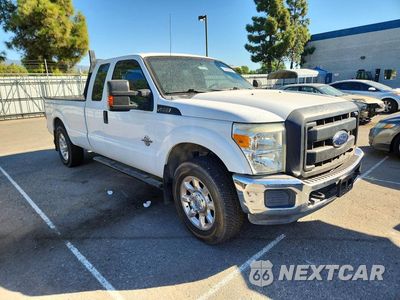 Czwarte zdjęcie samochodu z boku: 2014 FORD F250 SUPER DUTY VIN:1FT7X2AT9EEA53823 - miniatura