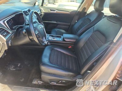 Zdjęcie 7 z 12 samochodu: 2017 FORD FUSION SE HYBRID VIN:3FA6P0LU6HR382329 - miniatura