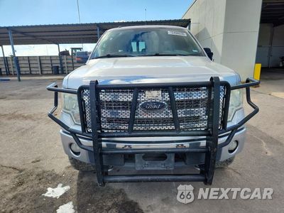 Piąte zdjęcie samochodu w środku: 2014 FORD F150 SUPERCREW VIN:1FTFW1EF0EKE98286 - miniatura