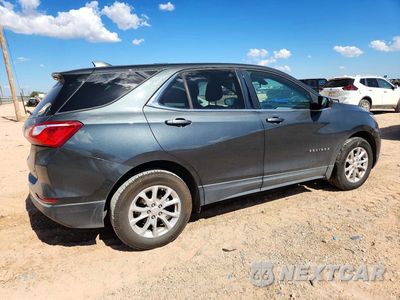 Trzecie zdjęcie samochodu z tyłu: 2018 CHEVROLET EQUINOX LT VIN:3GNAXJEV8JS535704 - miniatura