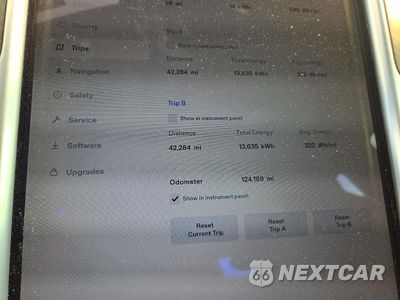 Zdjęcie 9 z 12 samochodu: 2015 TESLA MODEL S 90D VIN:5YJSA1V23FF097565 - miniatura
