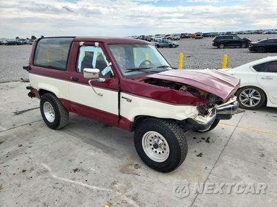 Czwarte zdjęcie samochodu z boku: 1990 FORD BRONCO VIN:1FMCU14T5LUA33015 - miniatura