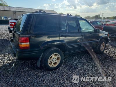 Trzecie zdjęcie samochodu z tyłu: 1996 JEEP GRAND CHEROKEE LIMITED VIN:1J4GZ78SXTC365088 - miniatura