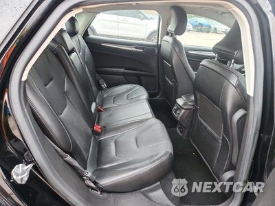 Zdjęcie 10 z 13 samochodu: 2016 FORD FUSION TITANIUM PHEV VIN:3FA6P0SU3GR121627 - miniatura