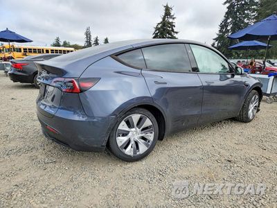 Trzecie zdjęcie samochodu z tyłu: 2023 TESLA MODEL Y VIN:7SAYGDEE2PA120856 - miniatura