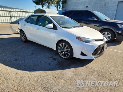 Czwarte zdjęcie samochodu z boku: 2017 TOYOTA COROLLA L VIN:5YFBURHE9HP723901 - miniatura