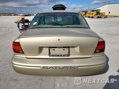 Zdjęcie 6 z 12 samochodu: 2002 SATURN SL1 VIN:1G8ZH52812Z176886 - miniatura