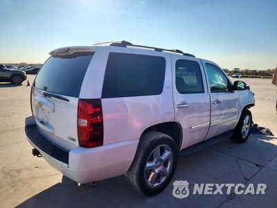 Trzecie zdjęcie samochodu z tyłu: 2011 CHEVROLET TAHOE C1500 LTZ VIN:1GNSCCE06BR380946 - miniatura