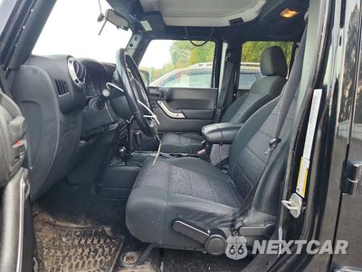 Zdjęcie 7 z 12 samochodu: 2012 JEEP WRANGLER UNLIMITED SAHARA VIN:1C4BJWEG5CL173448 - miniatura